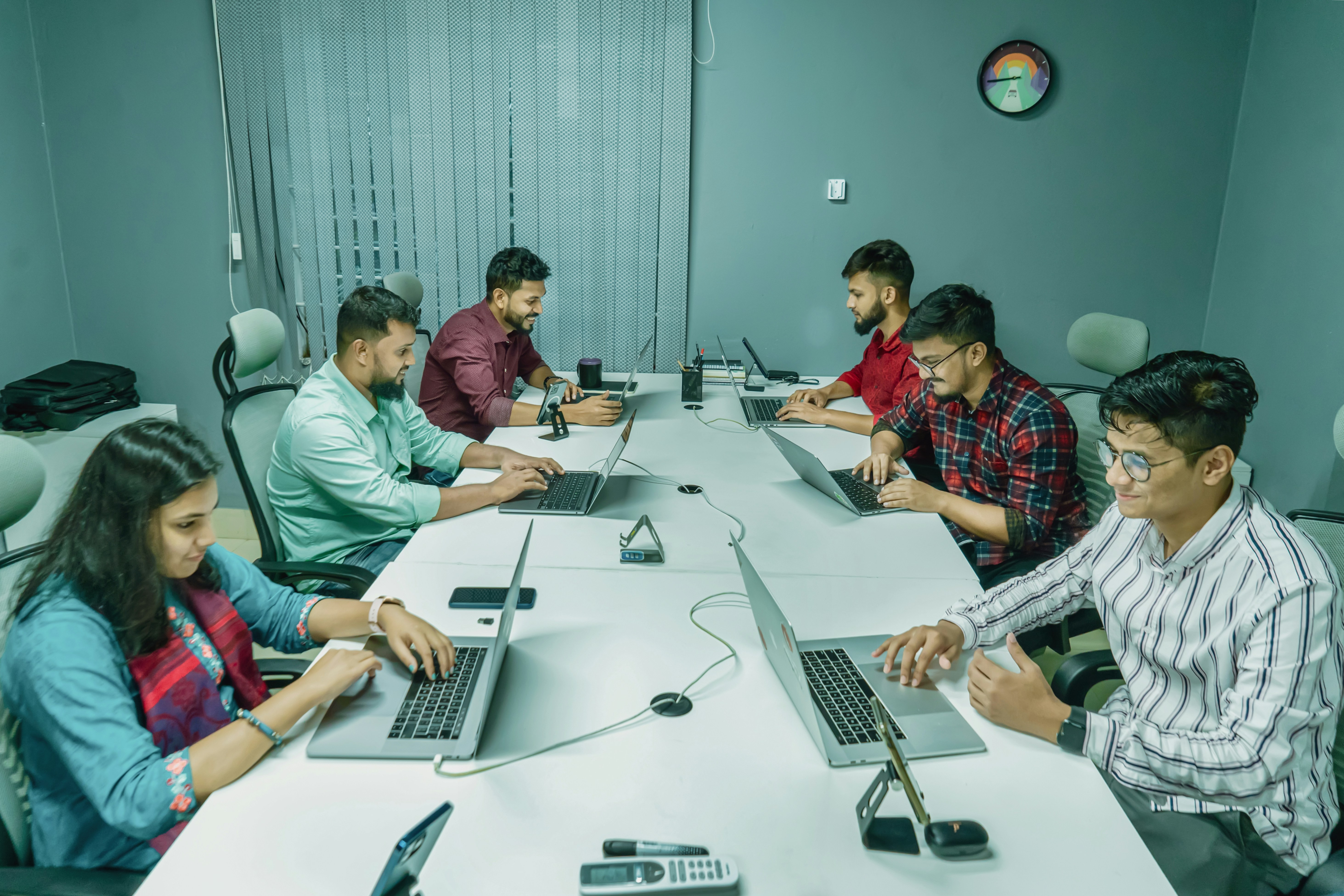 Business team discussing a project around a conference table